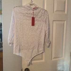 Sexy White Maer body suit. Lined with Long lace sleeves.